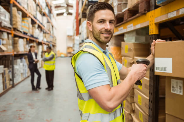 Checking stocks and scanning carton box